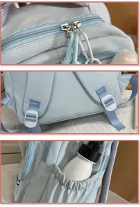 Cute cat embroidery school bag detail, light blue student backpack, casual travel daypack.