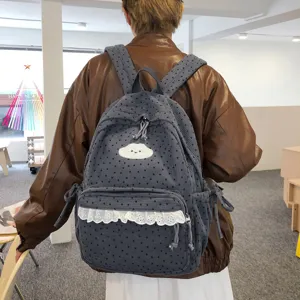 Japanese style cute corduroy backpack for women and students with star pattern and sweet lace trim.