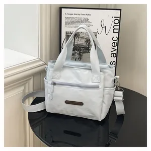 Casual nylon shoulder bag for women, simple crossbody tote with large capacity and multi pockets.