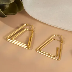 Gold geometric triangle hoop earrings, chic French style minimalist metal jewelry.