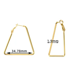 Detail view of golden stainless steel geometric triangle hoop earrings, showing precise size.