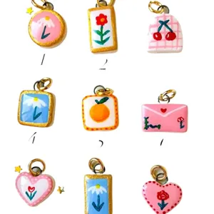 Süße DIY Anhänger Set mit Blumen Kirschen und Herzen Motiven für Schmuckherstellung Zubehör.