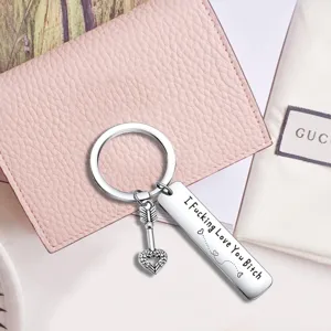 Stainless steel keychain with engraved heart arrow charm, ideal gift for couples and best friends.