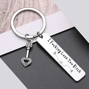 Stainless steel keychain with arrow heart pendant and engraved funny love message.