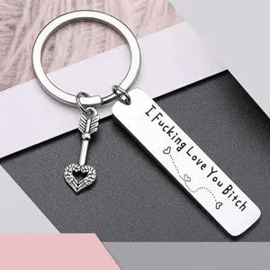 Stainless steel couple keychain with heart arrow pendant and engraved message tag gift.