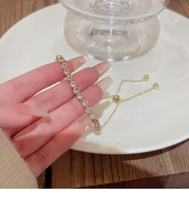Elegant sparkling zircon tennis bracelet for women, adjustable luxury design jewelry accessory.