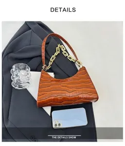 Chic brown crocodile pattern baguette shoulder bag with gold chain for women daily fashion.