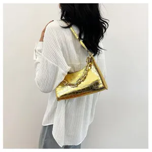 Metallic gold crocodile embossed underarm shoulder bag with chunky chain strap for women fashion.