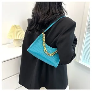 Chic blue crocodile pattern baguette shoulder bag with gold chain, trendy fashion purse.
