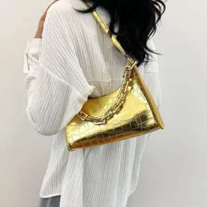 Gold metallic crocodile pattern baguette shoulder bag with trendy chunky chain strap.