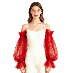 Close-up of sheer red tulle mesh arm sleeves showing delicate transparent texture and elastic cuffs.