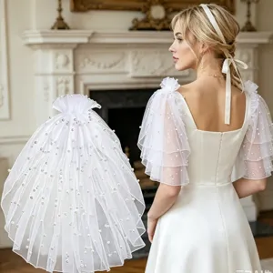Bridal detachable pearl mesh shoulder sleeves, elegant white wedding dress accessory for women.