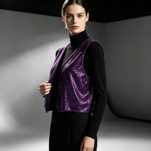 Detail view of a glamorous purple sequin vest layered over a black turtleneck, studio shot.