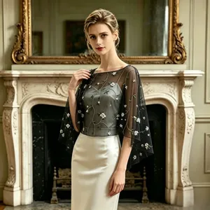 Elegant black mesh cape shawl with delicate white floral embroidery, perfect for evening dresses.