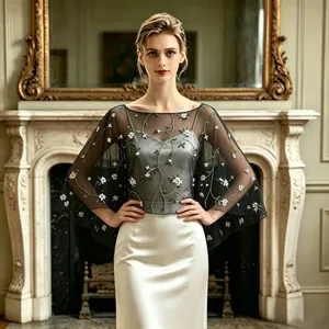 Elegant sheer mesh capelet with delicate floral vine embroidery for women evening party.