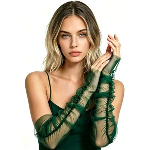 Detail view of sheer green tulle ruched long gloves, elegant bridal and party arm sleeves.