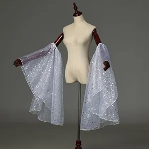 White star mesh sleeve detail showing the flowing bridal arm cover and elegant flared design.