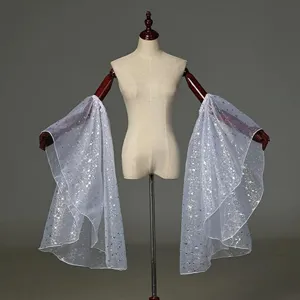 Details of sheer mesh flared sleeve with starry glitter, elegant arm cover accessory.