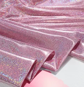 Rosa glänzender Glitzerstoff Material für Kostüm Nähen Handwerk und dekorative Textilzwecke.