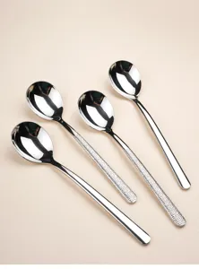 Roestvrijstalen lepel detailweergave, elegante ronde kom met getextureerd handvat.
