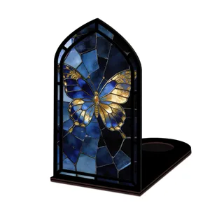 Inserto fermalibri in legno con design farfalla in vetrata e luce notturna dettaglio.