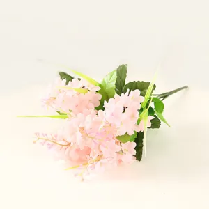 Close-up detail of the pink artificial hyacinth bouquet, showing realistic floral texture.