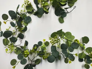 Artificial eucalyptus leaf vine for home decoration, realistic green plant garland for ceiling.
