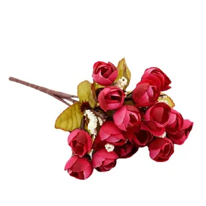 Artificial mini rose bouquet flower buds for wedding home decor and photography props.