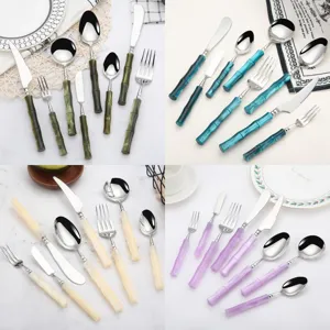 Stainless steel cutlery set with creative bamboo handles, including steak knife, fork and spoon.