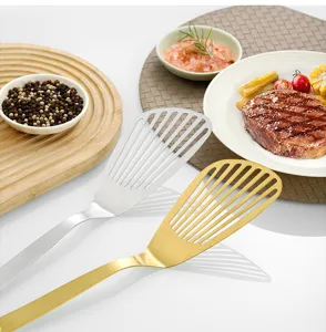 Stainless steel slotted cooking spatula set for kitchen, steak turner and frying fish tool detail view.