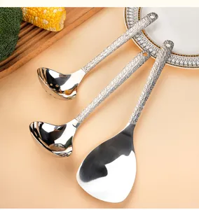 Stainless steel hammered kitchen spoon set, soup ladle and colander for home cooking.