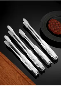 316 stainless steel food tongs detail shot, high quality kitchen BBQ meat grilling clip.