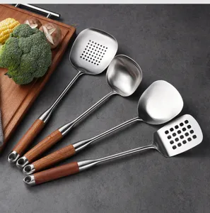 Detailed view of 304 stainless steel kitchen utensils set with ergonomic wooden handles.