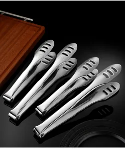 Stainless steel food tongs detail, 316 material, multi-hole design for kitchen BBQ and steak.