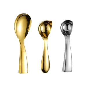 Stainless steel rice spoons set, modern ergonomic thick handle design, gold and silver kitchenware.