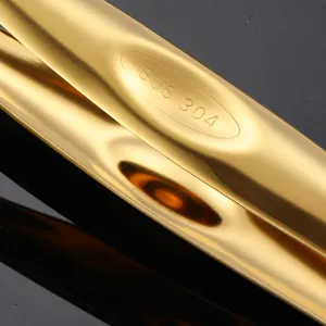 Stainless steel food tong, kitchen barbecue tong, golden brushed 304 material, durable cooking tool.