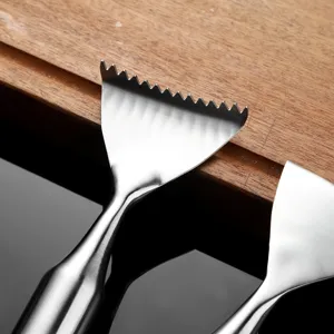 Roestvrijstalen viskrascher keuken gereedschap met getande mes voor eenvoudig ontkalken van vis.