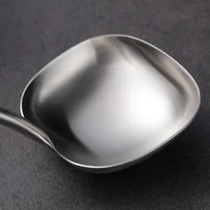 Stainless steel square soup ladle kitchen tool close up view durable metal spoon head