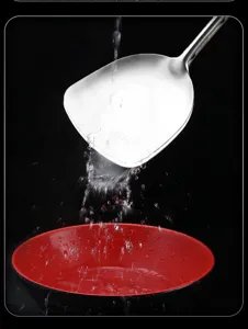 Stainless steel kitchen spatula with water splash effect for daily cooking and home use.