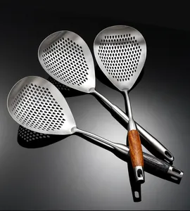 Stainless steel kitchen colander skimmer spoon with perforated mesh design and wooden handle.