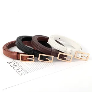Ceinture fine en cuir pour femme avec boucle métallique dorée pour robe et pull élégant.