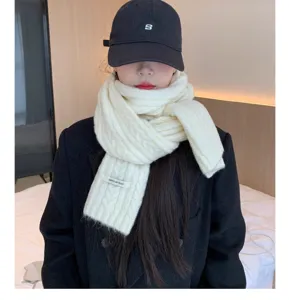 Detailed view of the cozy Korean style warm knitted cable wool blend scarf in solid white.