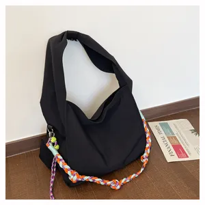 Borsa a tracolla in nylon nero con tracolla intrecciata colorata, grande borsa casual.