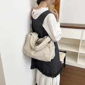 Elegante borsa a tracolla in nylon da donna, grande borsa con tracolla intrecciata colorata.
