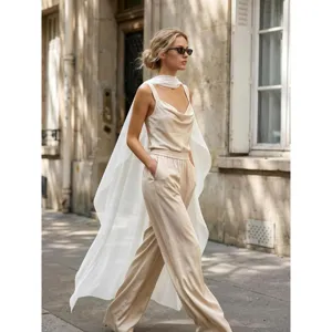Beige silk-feel camisole and pants set with sheer white chiffon cape for evening wear.