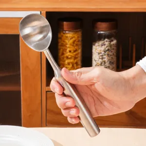 Stainless steel ice cream scoop and fruit melon baller with thick ergonomic handle.