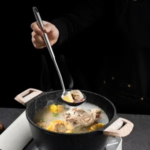 Stainless steel soup ladle with deep bowl and long handle for kitchen cooking and serving soup.