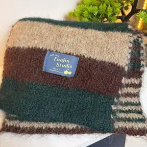 Cozy striped wool blend winter scarf detail, thick soft knit neck warmer for women.