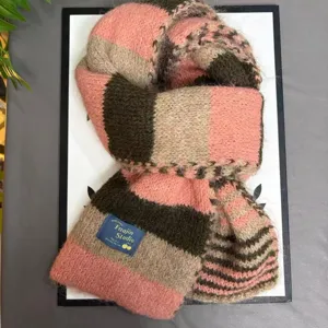 Cozy women's striped knit scarf, thick winter wool blend warm neck wrap, fashion casual accessory.