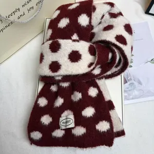 Cozy wool-blend knitted scarf featuring a chic two-tone polka dot design for autumn winter warmth.
